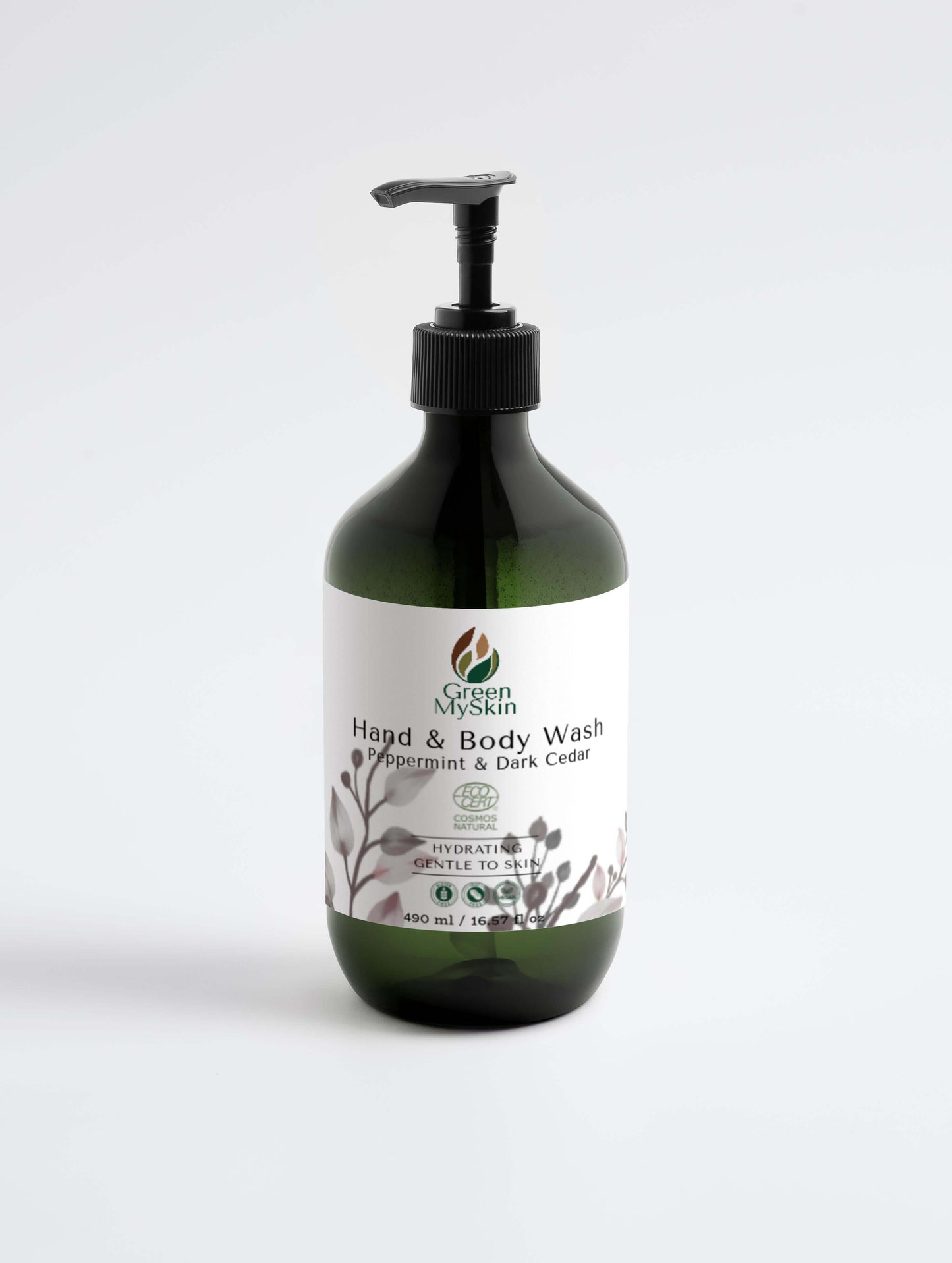 Gentle hand-body wash with peppermint and dark cedar in a black pump bottle.