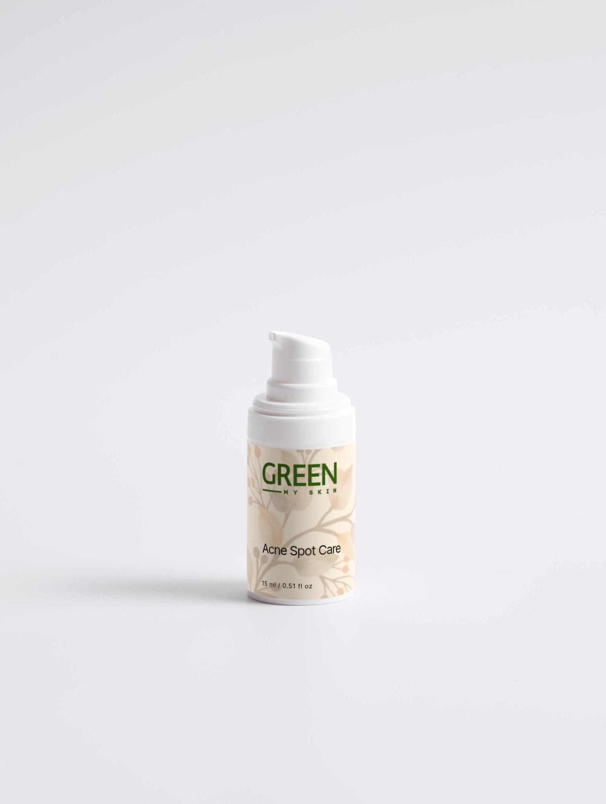 Acne Spot Care Serum bottle with pump dispenser on white background.