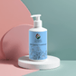 Bottle of hydrating conditioner, featuring a pump dispenser, formulated to fix dry hair and boost smoothness.