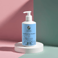 Gentle moisturising shampoo bottle for daily hair care with pump dispenser.