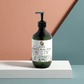 Ginger & Smoky Cardamom Hand-Body Wash, hydrating and vegan, in green pump bottle.