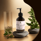 silk-skin-body-serum bottle with pump, offering deep hydration and woody amber & leather scent