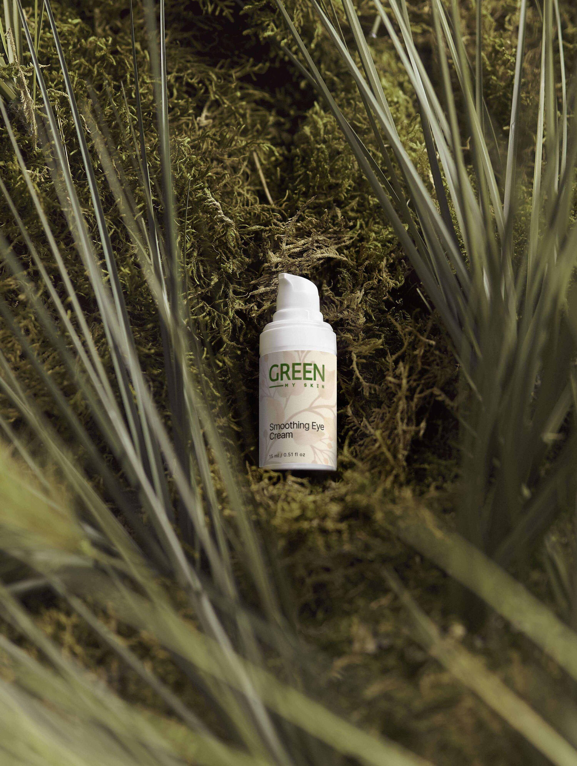 Vegan smoothing eye cream with organic, cruelty-free ingredients to reduce puffiness, dark circles, and fine lines around the eyes, available at greenmyskin.com.