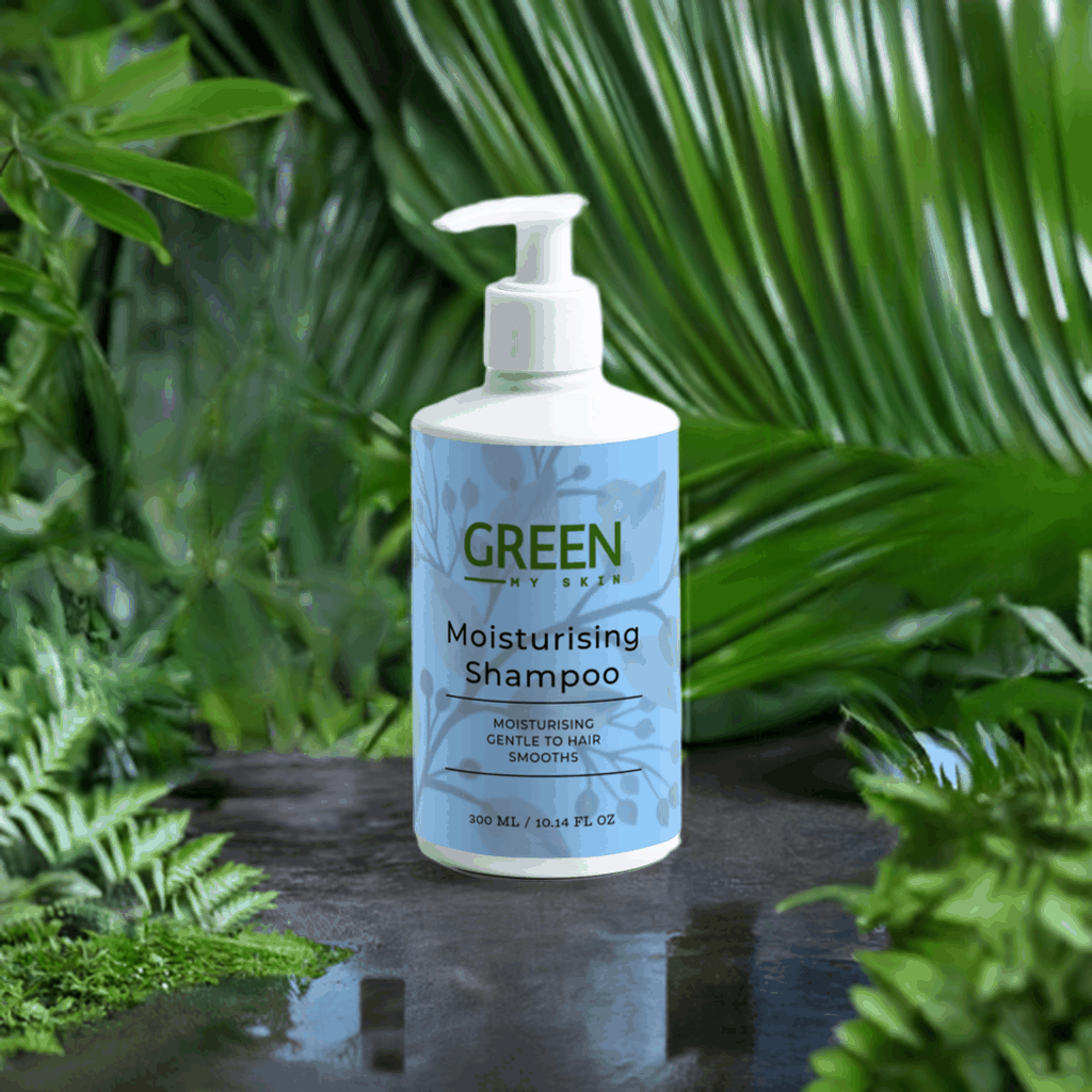Gentle Moisturising Shampoo bottle surrounded by lush green leaves, promoting daily hair care.
