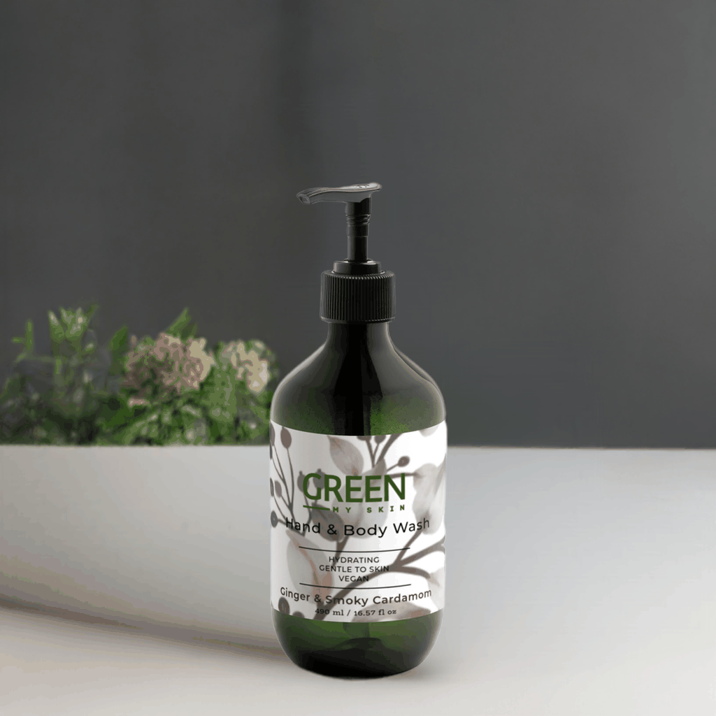 Ginger & Smoky Cardamom Hand-Body Wash in sleek pump bottle on countertop.
