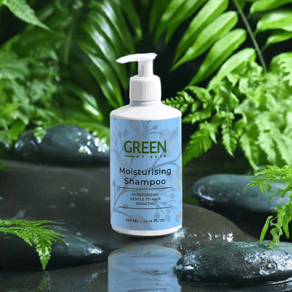 Gentle moisturising shampoo bottle surrounded by lush green foliage, emphasizing natural care.
