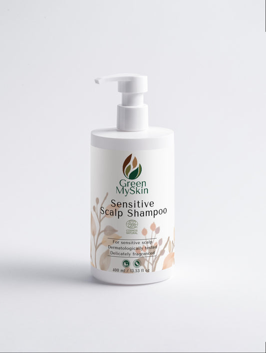 Bottle of Green My Skin Sensitive Scalp Shampoo on a light gray background